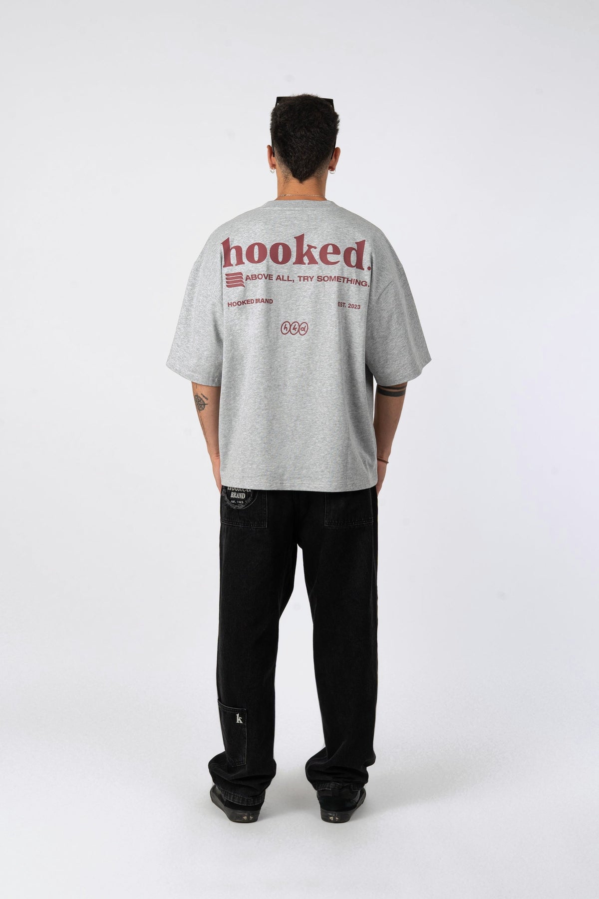 Polera oversize Hooked gris melange