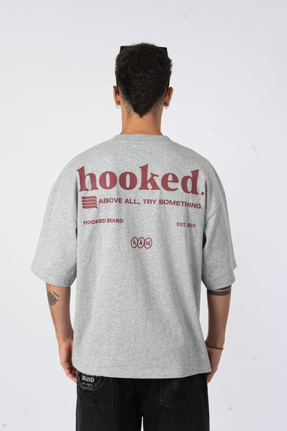Polera oversize Hooked gris melange - vista espalda
